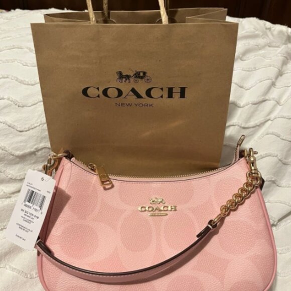 Coach Handbags - Coach Powder Pink Teri Shoulder Bag In Signature Canvas PRICE FIRM